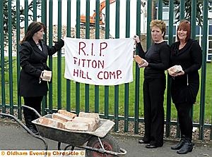 Fitton Hill Comprehensive demolition, Amanda Bullen, Lorraine Carter and Dawn Whipp get a souvenir brick from the site. Fitton Hill Comprehensive demolition, Amanda Bullen, Lorraine Carter and Dawn Whipp get a souvenir brick from the site.
