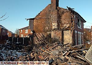 Jodie’s badly-damaged home that had to be demolished after the 2009 blast that flattened next door 