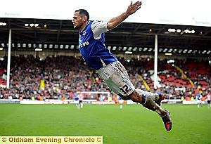COME FLY WITH ME . . . Shefki Kuqi celebrates in his usual style after slotting home a penalty in the stunning 3-2 comeback win against Sheffield United at Bramall Lane. 