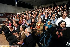 THE audience at Radclyffe School applaud a point  

