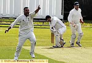 NOT OUT . . . Heyside opening batsman John Selby survives an appeal from Friarmere bowlerAzim Naseer. NOT OUT . . . Heyside opening batsman John Selby survives an appeal from Friarmere bowlerAzim Naseer.