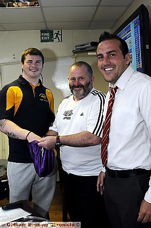 WHO PLAYS WHO? The draw for the Conference Challenge Cup second round was made at Saddleworth Rangers. From left: John Bateman (Bradford Bulls), Andy Harland (RFL representative for the National Conference), John McMullen (competition manager of the North-West Mens' League).