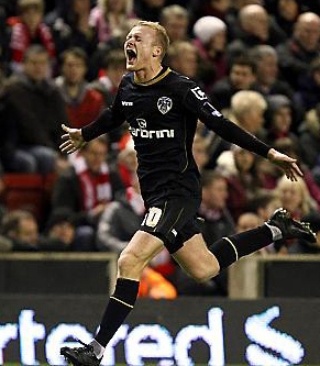 ROBBIE Simpson celebrates scoring at Anfield. ROBBIE Simpson celebrates scoring at Anfield.