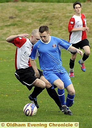 IN GOOD COMPANY: Jamie Gibson (right), of Legends, is challenged by Failsworth Athletic’s Dave Simpson. 