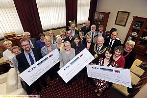 Oldham Mayor Cllr Richard Knowles presents his year's cheques to local charities. Oldham Mayor Cllr Richard Knowles presents his year's cheques to local charities.