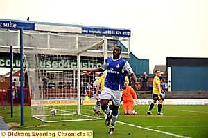 HEADS YOU WIN . . . Oumare Tounkara celebrates his winning goal for Athletic. 
