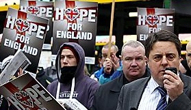 TWEET: BNP leader Nick Griffin (right) 

