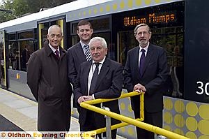 GREAT day for Oldham . . . pictured (from the left) are Charlie Parker, Oldham Council chief executive; council leader Jim McMahon, Councillor Dave Hibbert, cabinet member for housing, transport and regeneration; and Andrew Fender, chairman of the Transport for Greater Manchester committee
GREAT day for Oldham . . . pictured (from the left) are Charlie Parker, Oldham Council chief executive; council leader Jim McMahon, Councillor Dave Hibbert, cabinet member for housing, transport and regeneration; and Andrew Fender, chairman of the Transport for Greater Manchester committee