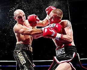 IN THE THICK OF IT . . . Craig Watson (left) clashes with Tomasz Mazurkiewicz. PICTURE: MARK ROBINSON. IN THE THICK OF IT . . . Craig Watson (left) clashes with Tomasz Mazurkiewicz. PICTURE: MARK ROBINSON.