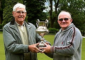 CUP OF JOY . . . Bob Carr (right) receives the McIntosh Cup from league president Bill Connelly. CUP OF JOY . . . Bob Carr (right) receives the McIntosh Cup from league president Bill Connelly.