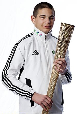 OLDHAM freestyle wrestler and Waterhead Academy pupil Daniel Panczyszyn with the Olympic Torch.