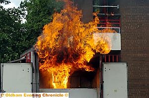 BLAZE: a fire ignites just five minutes after firefighters begin their staged chip-pan inferno 
