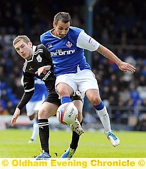 FILIPE MORAIS . . . talks with Latics boss Paul Dickov. FILIPE MORAIS . . . talks with Latics boss Paul Dickov.