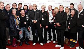 WEDDING gift . . . Sally and Alan (back fifth and sixth left) behind Francis Rossi (centre) and Rick Parfitt (right) and other fans backstage
WEDDING gift . . . Sally and Alan (back fifth and sixth left) behind Francis Rossi (centre) and Rick Parfitt (right) and other fans backstage