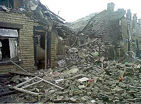 Devastation: The explosion ripped through three homes and damaged many others, killing toddler Jamie in the process.  

