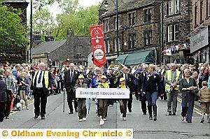 COMING through the crowds... are Kilngreen Church and Diggle Band. Picture: CHRIS SUNDERLAND COMING through the crowds... are Kilngreen Church and Diggle Band. Picture: CHRIS SUNDERLAND