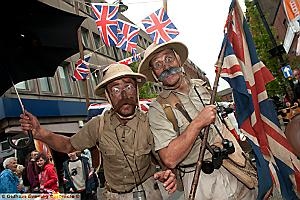 REVELLERS were treated to super Jubilee entertainment in Oldham town centre. Gymnastics, brass bands, and Dad’s Army style performers kept the crowds entertained despite the rain. 
