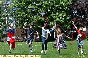 CHILDREN were flying high with happiness when their hand-made Jubilee kites took to the skies. The youngsters from East Crompton St George’s School, Shaw, sported red, white and blue clothes to mark the celebrations as they flew their Union Jack kites. 