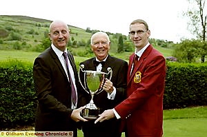 DRESSED FOR SUCCESS: Steven Smith (centre) receives the trophy from Evening Chronicle editor David Whaley (left) and Oldham captain Barry Lewis. DRESSED FOR SUCCESS: Steven Smith (centre) receives the trophy from Evening Chronicle editor David Whaley (left) and Oldham captain Barry Lewis.