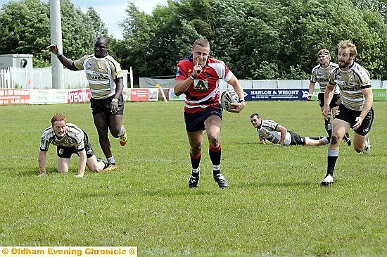 Dallimore dissects the Skolars line to score Oldham’s second try of the afternoon. 