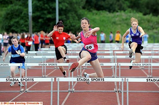 WORK ETHIC: Emma Burman wins Year 10 hurdles for Crompton House. WORK ETHIC: Emma Burman wins Year 10 hurdles for Crompton House.