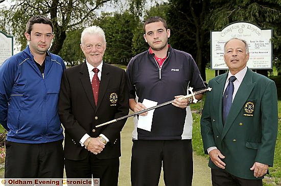 CUT ABOVE THE REST . . . Royton Sword winner Ciaran Doherty (second from right) receives his prize from Crompton and Royton Golf Club captain Paul Harrison, flanked by his brother Sean (far left) and club president Collin Howarth. CUT ABOVE THE REST . . . Royton Sword winner Ciaran Doherty (second from right) receives his prize from Crompton and Royton Golf Club captain Paul Harrison, flanked by his brother Sean (far left) and club president Collin Howarth.