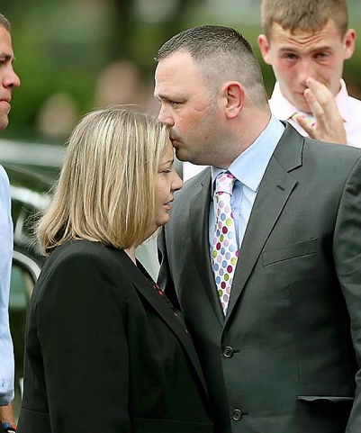 COMFORT: Jamie’s parents Kenny and Michelle 
