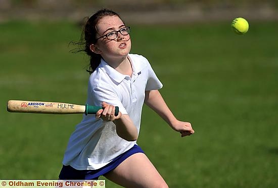 ON THE BALL: Kaitlin Williams, of Hulme A in action in the Oldham Schools rounders finals. ON THE BALL: Kaitlin Williams, of Hulme A in action in the Oldham Schools rounders finals.