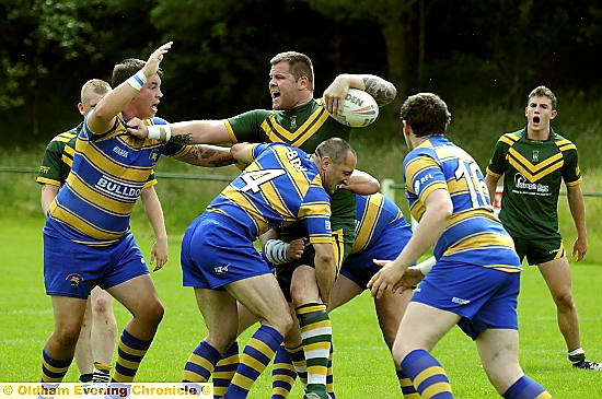 OLDHAM St Anne’s prop forward David Best holds on to the ball against Dudley Hill. OLDHAM St Anne’s prop forward David Best holds on to the ball against Dudley Hill.