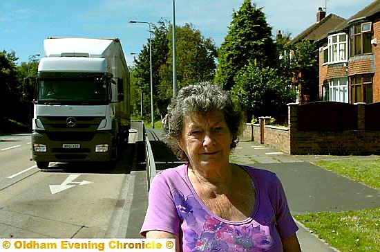 LORRIES pound past Mrs Smith’s home 
