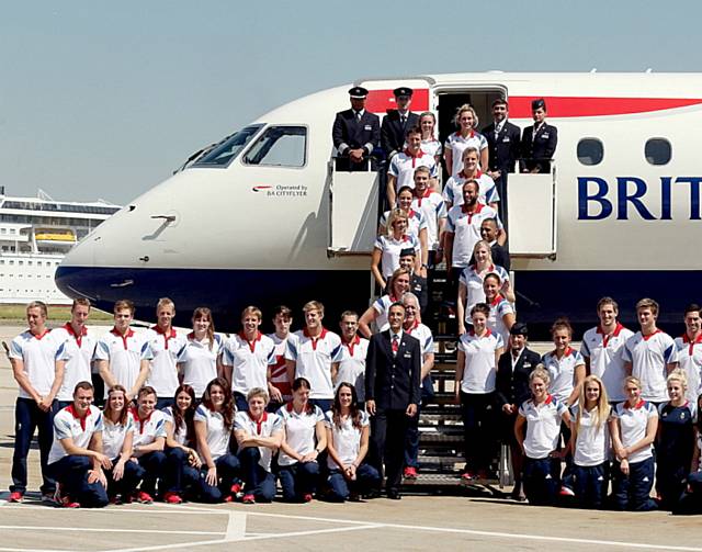 WINGING IN: Great Britain’s swimming team at London City Airport, with Diggle’s Jessica Lloyd on the front row, fifth from the left.