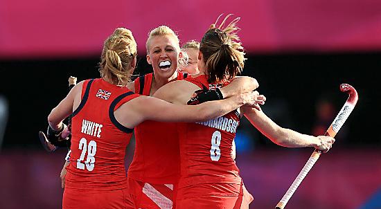 Nicola (left) congratulates Danson (centre) after she scored the first goal. Nicola (left) congratulates Danson (centre) after she scored the first goal.