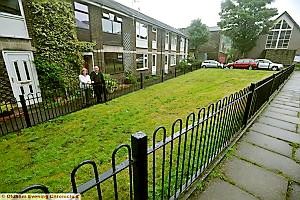 FENCED off: Janet Callander and Brian Hall outside their homes
FENCED off: Janet Callander and Brian Hall outside their homes