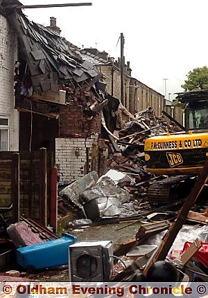 RUBBLE is removed from the blast site RUBBLE is removed from the blast site