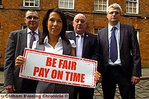 MP Debbie Abrahams challenges FTSE100 companies to sign the Prompt Payment Code. Pictured with her from, the left, are Philip King, Phil Thompson (Federation of Small Businesses and Phil McCabe (senior policy advisor with the Forum of Private Business) MP Debbie Abrahams challenges FTSE100 companies to sign the Prompt Payment Code. Pictured with her from, the left, are Philip King, Phil Thompson (Federation of Small Businesses and Phil McCabe (senior policy advisor with the Forum of Private Business)