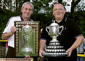 TROPHY TIME: Steve Copeland (left) and Alan Hodson show off their silverware. TROPHY TIME: Steve Copeland (left) and Alan Hodson show off their silverware.