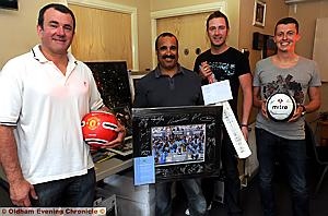 The charity auction at Heyside Cricket Club. Pictured (from the left) Tony Heaton, Andy Holloway and Scott Bloor
The charity auction at Heyside Cricket Club. Pictured (from the left) Tony Heaton, Andy Holloway and Scott Bloor