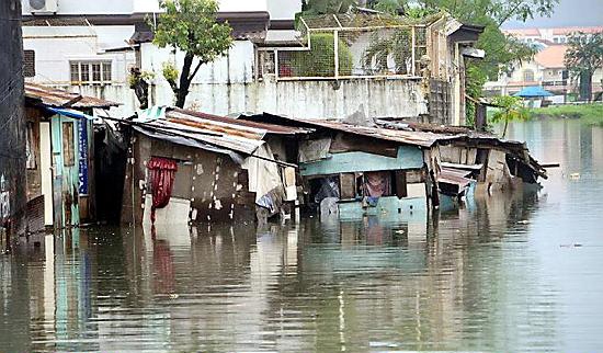 RISING waters . . . one of John’s pictures of the devastating floods  

