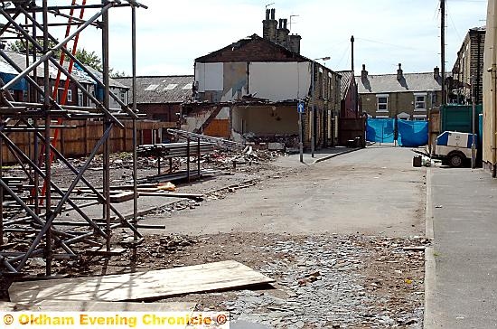 Buckley Street yesterday, where demolition and clean-up work continues 
