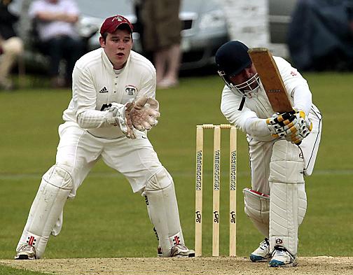 BATSMAN Faisal Butt in action for Delph in the Sykes Cup final. BATSMAN Faisal Butt in action for Delph in the Sykes Cup final.