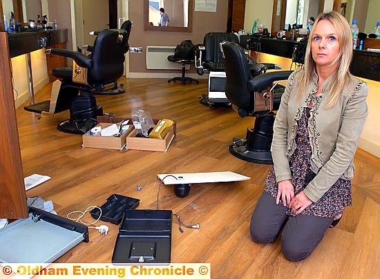 HEARTBREAK: Royton Barbers owner Sharon Ruscillo in the aftermath of the burglary
HEARTBREAK: Royton Barbers owner Sharon Ruscillo in the aftermath of the burglary