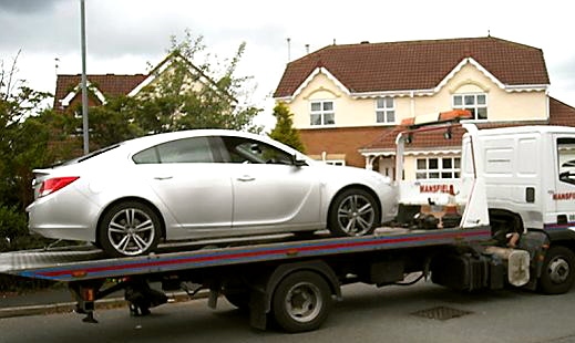 A car is impounded by police
A car is impounded by police