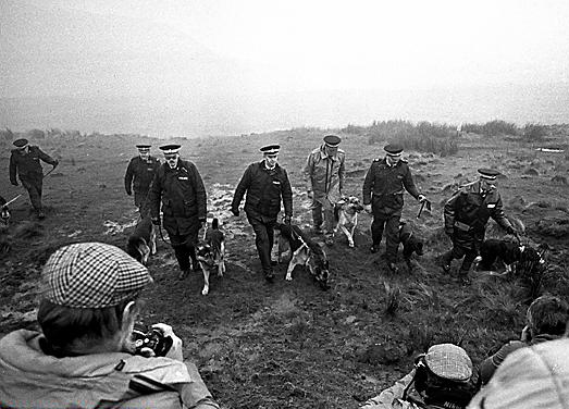 A photo taken in 1986, when police searched the moors with specially-trained sniffer dogs  

