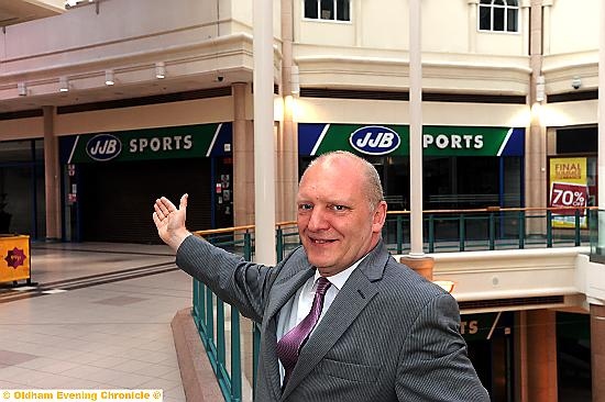 SHOPPING central . . . Mike Flanagan shows where the new British Home Stores will be, replacing the empty former JJB outlet SHOPPING central . . . Mike Flanagan shows where the new British Home Stores will be, replacing the empty former JJB outlet