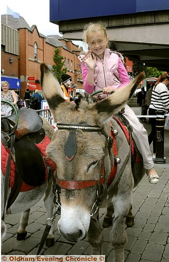 RIDE on time: Olivia Wood on Paddy in the town centre on Saturday. 