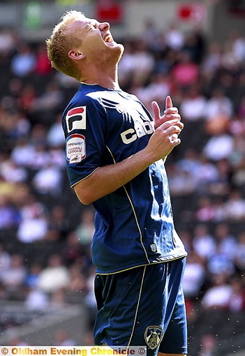 NOT MY DAY: Athletic striker Robbie Simpson shows his frustration at missing a chance 