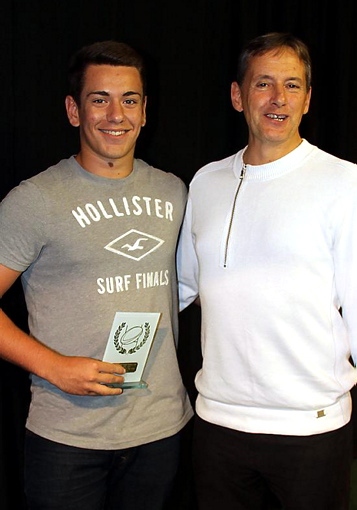 Richard Walker (left) receives his player of the year award from Phil Costin. Richard Walker (left) receives his player of the year award from Phil Costin.