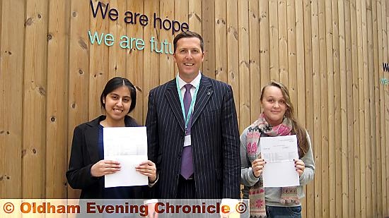 CLASS act: pupils Ikra Majid (left) Naomi Sutton with principal David Hayes
CLASS act: pupils Ikra Majid (left) Naomi Sutton with principal David Hayes
