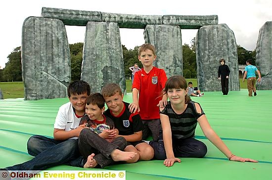 GREAT fun: from left, Dewi, Huan and Emrys Harris-Larkin, and Will and Megan Maddocks on the giant inflatable 
