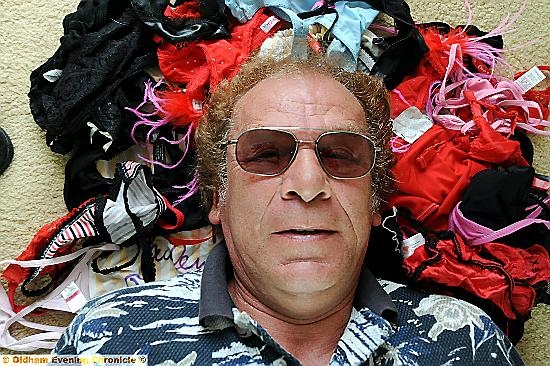 KNICKER bonkers glory: Sir Tom Jones soundalike Ray Dean with some of the frillies which have been flung in his direction KNICKER bonkers glory: Sir Tom Jones soundalike Ray Dean with some of the frillies which have been flung in his direction